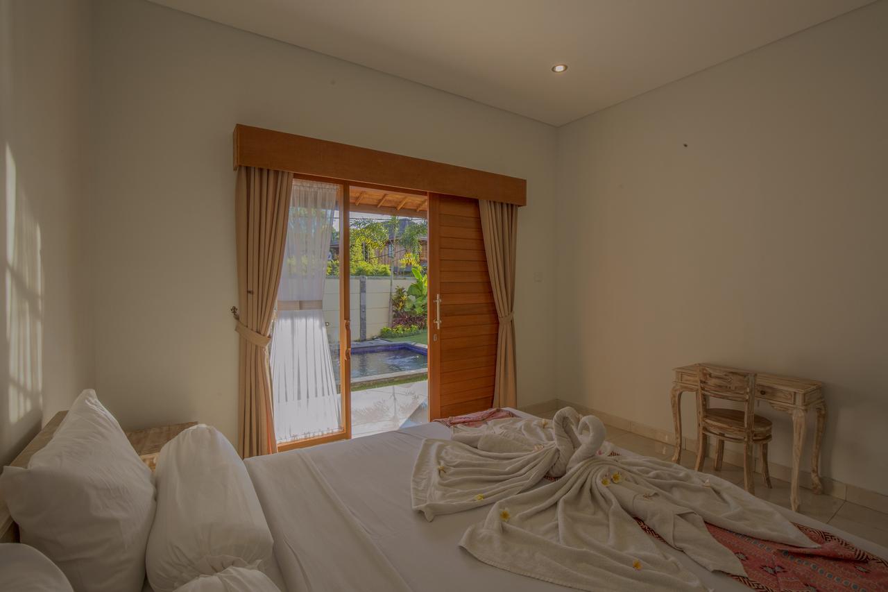 Aghasvina Guest House Canggu エクステリア 写真
